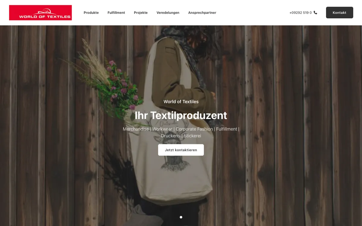 World of Textiles homepage. German print-on-demand provider with direct contact and a range of finishing options.